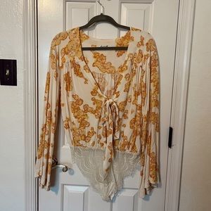 Free people forties feels body suit with long bell sleeves and lace bottoms